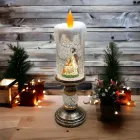 Діва-Марія Декоративна новорічна LED свічка зі снігом, 25см, від батарейок та USB