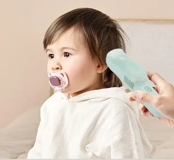 Машинка для стрижки дітей безшумна з витяжкою VGR V-155, 4 безпечні насадки, IPX8, зелена