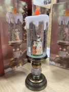 Діва-Марія Декоративна новорічна LED свічка зі снігом, 25см, від батарейок та USB