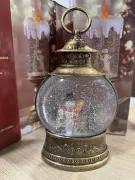 Сніговик Чарівний ліхтар круглої форми "З анімацією" 26 см., новорічний світильник
